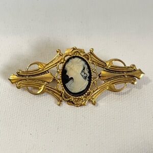 Vintage cameo golden brooch